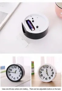 Detailed views of minimalist round alarm clock with battery compartment and glowing hands.