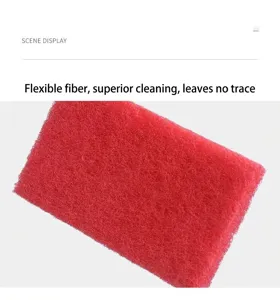 Detailed macro shot of red scouring pad texture showing durable and flexible fibers