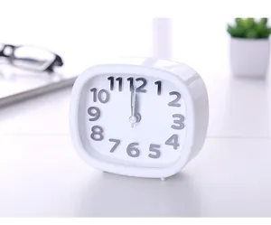 Modern white minimalist table alarm clock with grey numbers for home and dorm decor