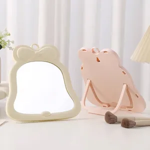 Cute ins-style bow-knot desktop makeup mirror with a sturdy folding stand for dorm