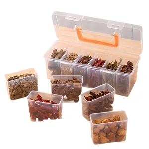 Transparent multi-compartment spice storage box with orange handle for kitchen organization
