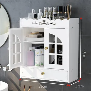 White wall-mounted bathroom storage cabinet with drawer and elegant carved design patterns