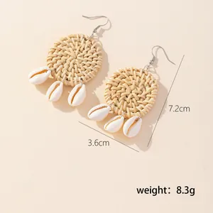 Retro handmade woven rattan earrings with natural cowrie shell pendants