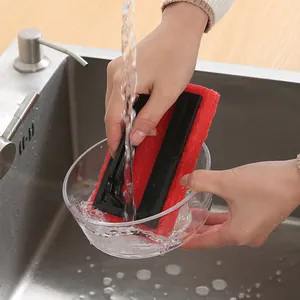 Cleaning sponge brush with handle for kitchen sink and dishwashing.