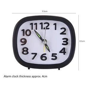 Simple black and white analog alarm clock with luminous hands, 9.5x8.5cm portable size