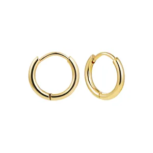 Detail view of high-polished gold stainless steel minimalist round hoop earrings.