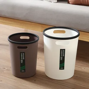 Minimalistische ronde vuilnisbakken met handvatten en zakringen voor thuisgebruik