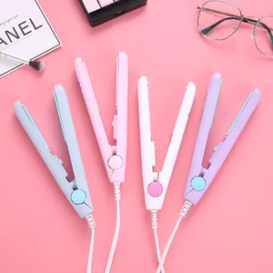 Four mini multi-functional hair straighteners and curlers in various pastel colors