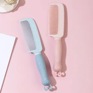 Cute cartoon rabbit handle hairbrushes in pink and blue, perfect for girls and student dorms