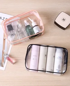 Clear PVC waterproof makeup organizer bag with pink and black trim for travel toiletries