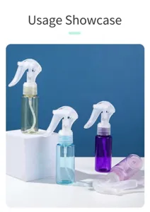 Close-up of 60ml portable travel spray bottles in multiple colors with fine mist nozzles