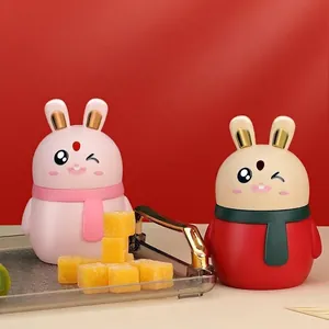 Two cute cartoon bunny automatic pop-up toothpick dispensers in pink and red for home decor
