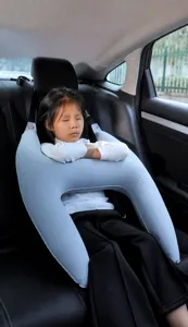 Cojín de coche inflable azul para niños que brinda soporte para dormir durante el viaje