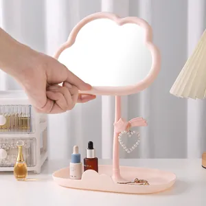 Pink cloud shaped rotatable makeup mirror with jewelry storage tray and star hook holder