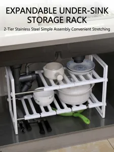 Detailweergave van de uitschuifbare gootsteenorganizer voor potten en kommen in het kastje