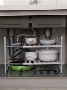 Adjustable stainless steel under-sink storage rack shown in a kitchen cabinet.