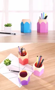 Creatieve bureaupenhouder in potloodvorm voor het opbergen van kantoorartikelen.