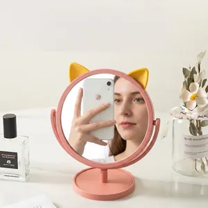 Tragbarer rosa Kosmetikspiegel mit süßen Katzenohren und drehbarem runden Sockelständer