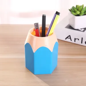 Kreativer stiftehalter in bleistiftform mit blauem und pfirsichfarbenem design für den schreibtisch