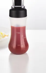 Detail showing the measurement scale and PE material of the sauce squeeze bottle