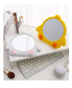 Cute chicken-shaped desktop makeup mirrors in yellow and grey colors