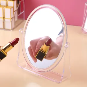 Transparent oval double-sided desktop makeup mirror with rotating plastic stand