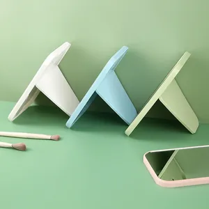 Portable foldable desktop makeup mirror in pastel plastic colors for vanity and table
