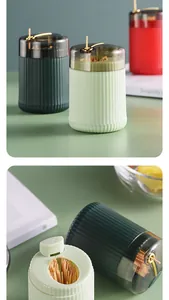 Close-up detail of modern press-type automatic toothpick holders in stylish colors