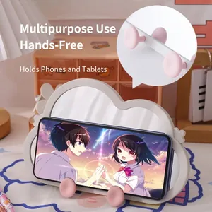 Multifunctional cloud-shaped mirror and phone stand holder in a cozy desktop setting