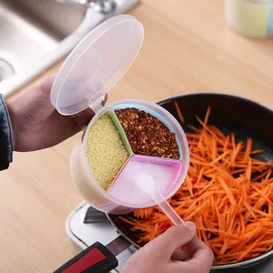3-compartment circular seasoning box with clear lid and spoon for kitchen spice storage