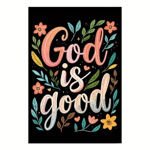 Detail view of colorful floral garden flag featuring artistic 'God is good' typography design