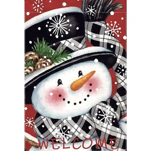 Festive Christmas garden flag detail featuring a smiling snowman with a welcome greeting