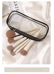 Close-up of makeup brushes inside a large capacity transparent PVC storage bag