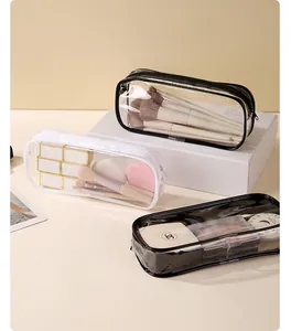 Transparent PVC storage bags for pencils and makeup brushes in black and white.