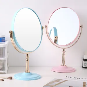 Elegant double-sided rotatable desktop makeup mirrors with iron stands in blue and pink