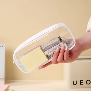 Large capacity transparent PVC waterproof pencil case shown with colorful stationery inside
