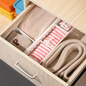 Divisores de cajones ajustables de plástico blanco para organizar ropa y accesorios