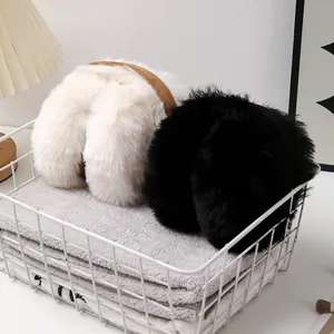 Cozy plush winter earmuffs in black and white for effective cold weather protection
