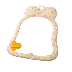 Eleganter mit Strass besetzter Schminkspiegel in Schleifenform für Tisch oder Wand