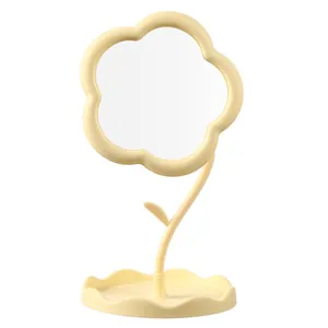 Miroir de maquillage minimaliste en forme de fleur avec plateau de rangement jaune crème