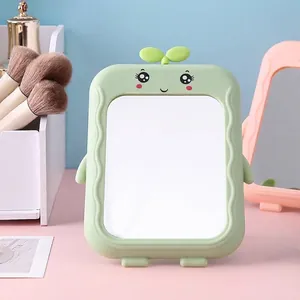 Cute mint green cartoon desktop makeup mirror with sprout design and wave texture frame