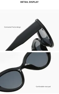 Detailed view of black trendy sunglasses showing frame design and comfortable nose pads