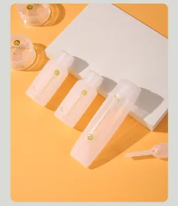 Travel cosmetic dispensing set with transparent 15ml bottles and 30ml squeeze tube
