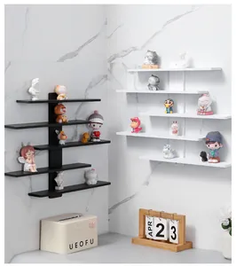 Detailed view of wall-mounted multi-tier display shelves for figurines and collectibles