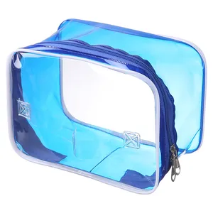 Neceser portátil de PVC azul transparente e impermeable para viajes y almacenaje.