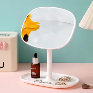 Elegant white desktop makeup mirror with jewelry storage tray and rotatable design