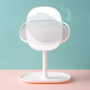 Minimalist white rotatable desktop makeup mirror with square frame and storage base tray