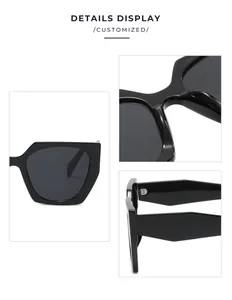 Macro view of black designer sunglasses showing reinforced hinges and thick temples.