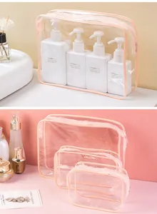 Professionelles Set aus klaren PVC-Kulturbeuteln mit rosa Rand zur Reiseorganisation