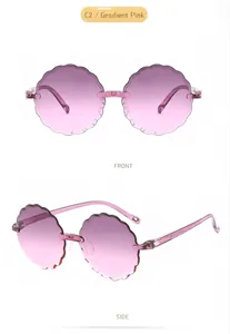 Detail view of floral rimless kid sunglasses in gradient pink with cute wavy edges